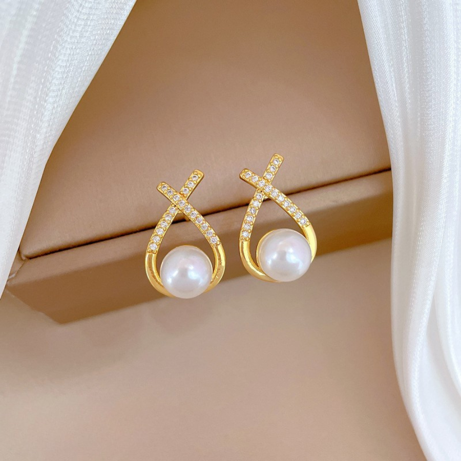 Conjunto nudo cruzado de piedras con perla